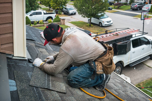 Professional Flat Roof Repair technician working in Evansville, AR